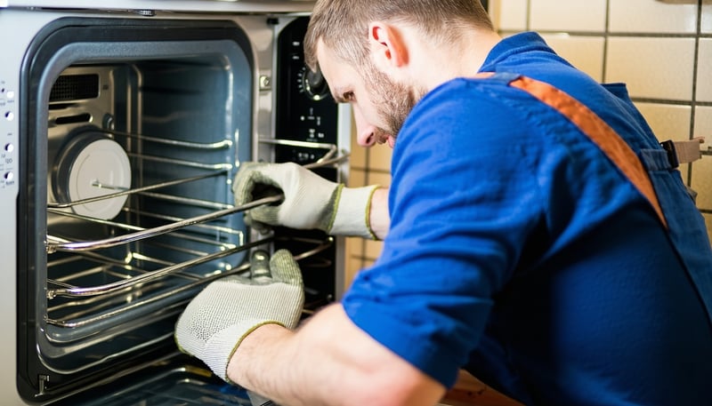 Bullion Appliance Repair technician servicing a home appliance in Richlands, VA